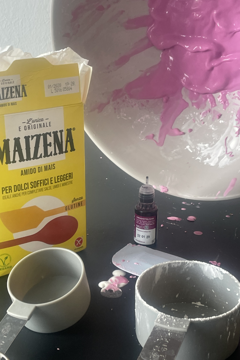 Ingredients for non-Newtonian fluid experiment — cornflour, water and food colouring
