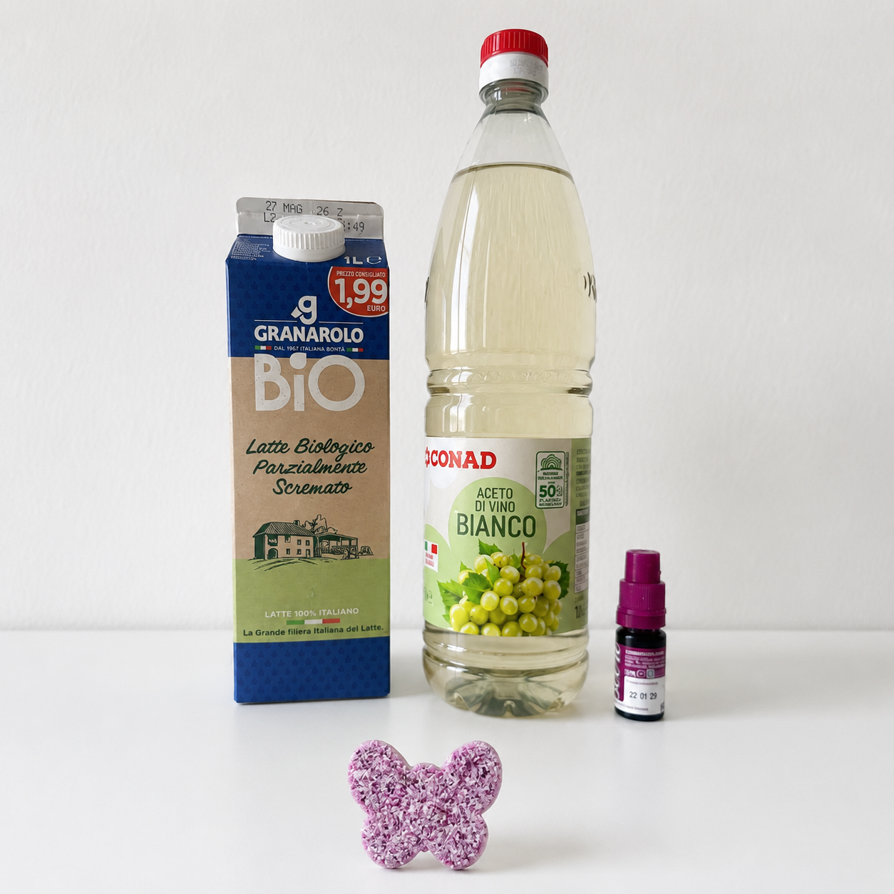 Ingredients for milk plastic experiment — full fat milk, white wine vinegar and food colouring